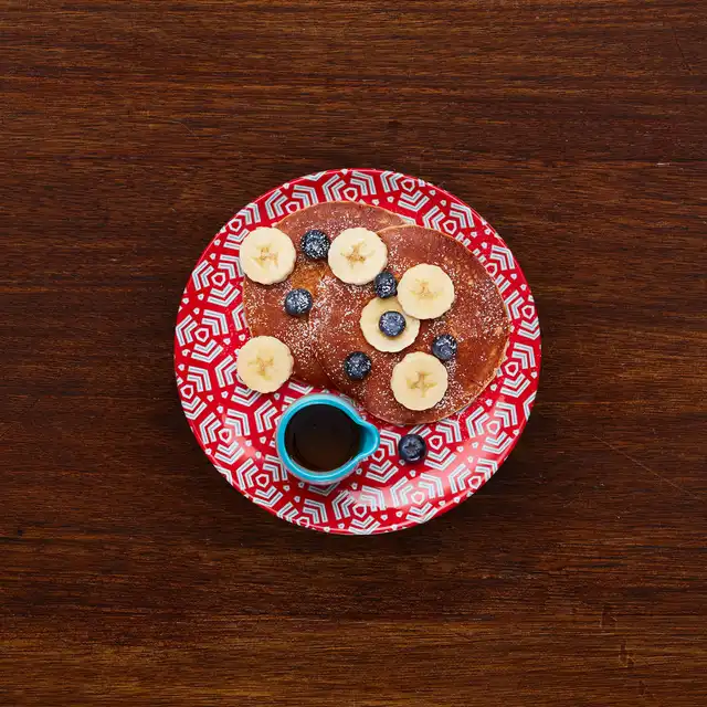 NANDOS_WOODEN_BREAKFAST_NANDOS'S_PANCAKES_&_FRUIT_MAR22_1932x1932